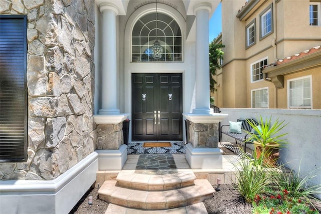 12 Thorn Oak, Rancho Santa Margarita, CA 92679 - doorway to property featuring stone siding