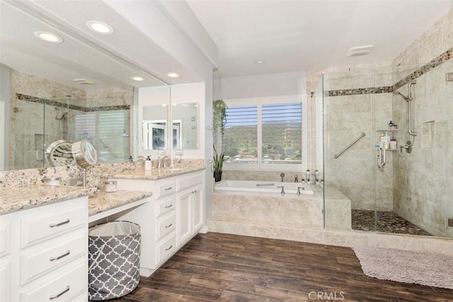 12 Thorn Oak, Rancho Santa Margarita, CA 92679 - bathroom with a garden tub, a shower stall, vanity, wood finished floors, and recessed lighting