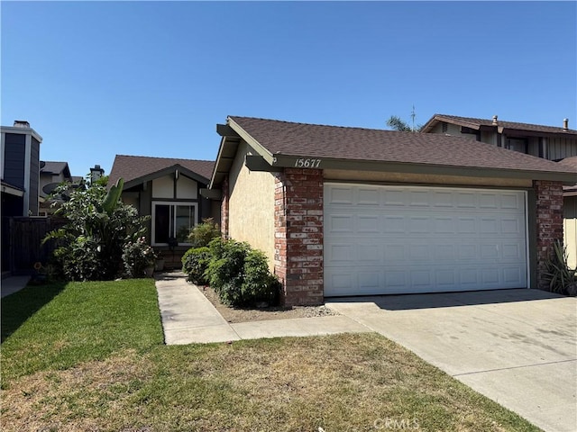 15677 Barbee St, Fontana, CA 92336 - view of front of home with an attached garage, concrete driveway, a front lawn, brick siding, and roof with shingles