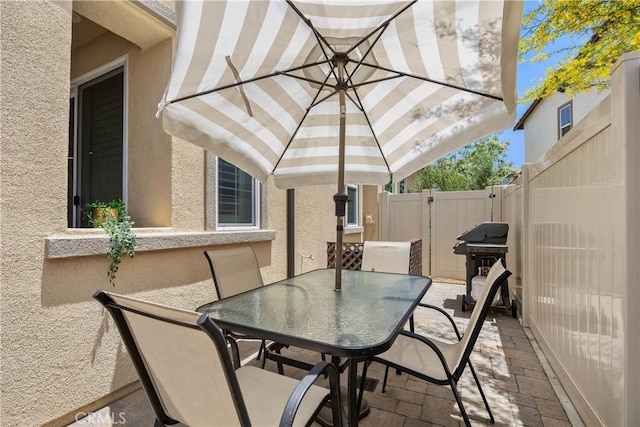 45437 Calle Cirros, Temecula, CA 92592 - view of patio with outdoor dining space, grilling area, and a gate