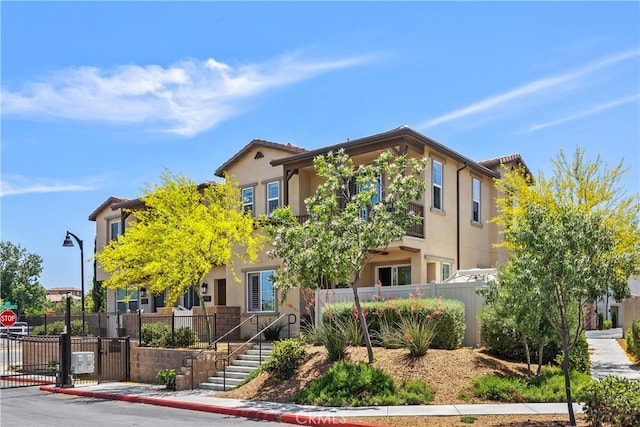 45437 Calle Cirros, Temecula, CA 92592 - view of front of home featuring stucco siding