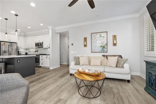 45437 Calle Cirros, Temecula, CA 92592 - living area featuring a ceiling fan, light wood-style flooring, crown molding, and recessed lighting