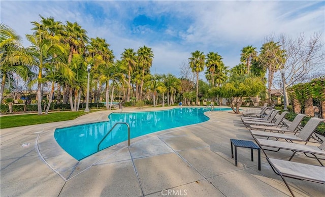 6611 Eucalyptus Ave, Chino, CA 91710 - community pool with a patio and view of scattered trees