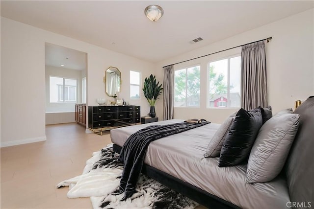 6611 Eucalyptus Ave, Chino, CA 91710 - bedroom featuring multiple windows and baseboards