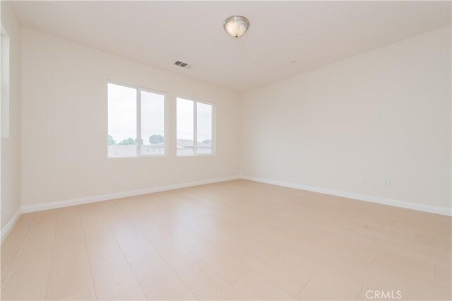 6611 Eucalyptus Ave, Chino, CA 91710 - unfurnished room featuring light wood finished floors and baseboards