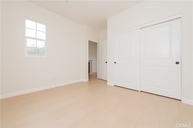6611 Eucalyptus Ave, Chino, CA 91710 - unfurnished bedroom featuring baseboards and a closet