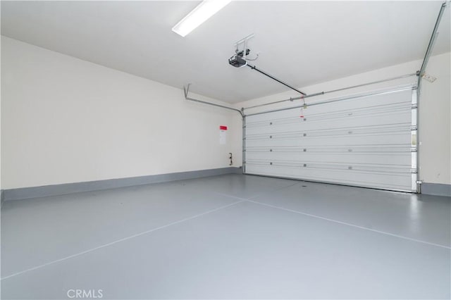 6611 Eucalyptus Ave, Chino, CA 91710 - garage with a garage door opener