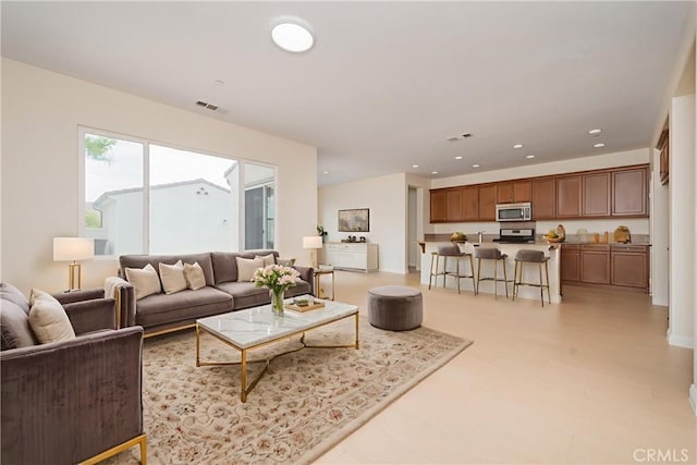 6611 Eucalyptus Ave, Chino, CA 91710 - living area featuring recessed lighting