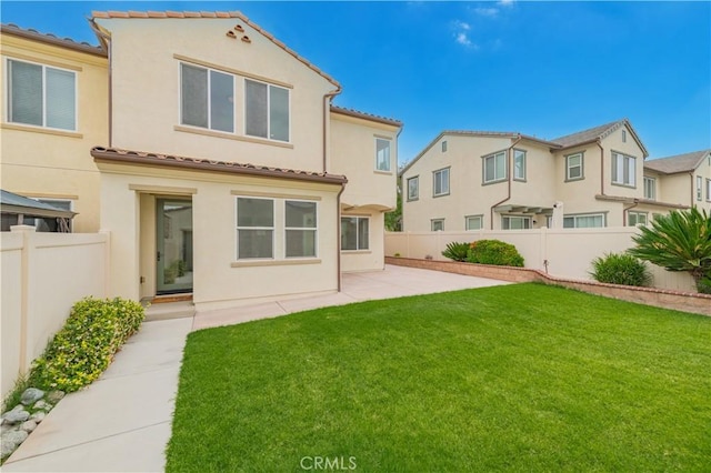 6611 Eucalyptus Ave, Chino, CA 91710 - rear view of house with a tile roof, a patio area, and stucco siding