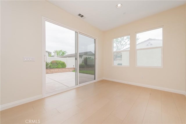 6611 Eucalyptus Ave, Chino, CA 91710 - spare room with baseboards, recessed lighting, and light wood-style flooring