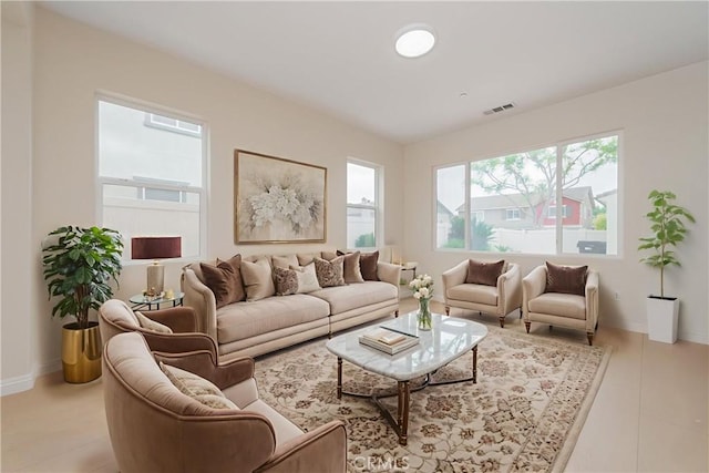 6611 Eucalyptus Ave, Chino, CA 91710 - living room featuring baseboards and light tile patterned flooring