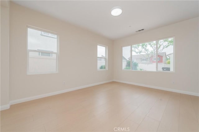 6611 Eucalyptus Ave, Chino, CA 91710 - spare room with light wood-style flooring and baseboards