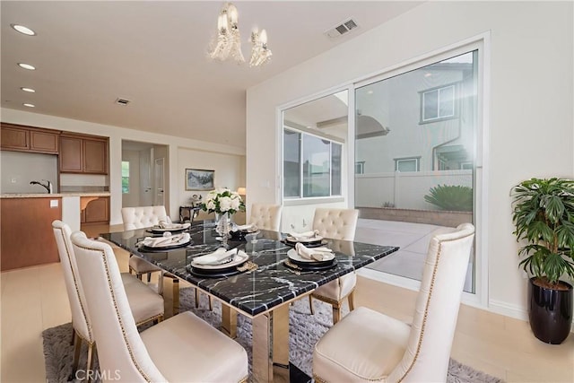 6611 Eucalyptus Ave, Chino, CA 91710 - dining space featuring a chandelier and recessed lighting