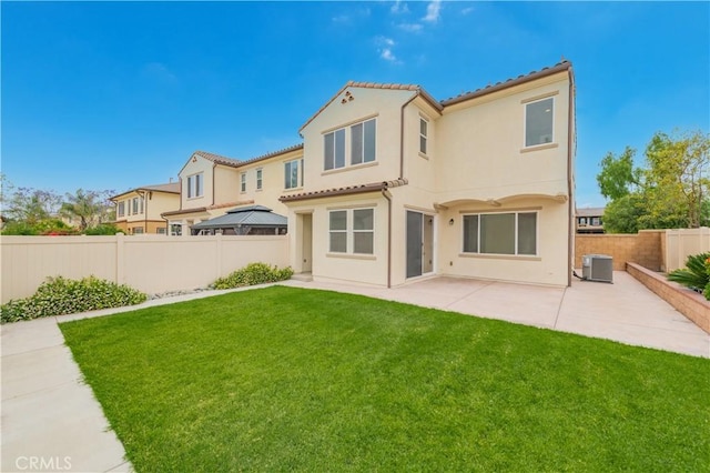 6611 Eucalyptus Ave, Chino, CA 91710 - back of house with a tiled roof, a patio, stucco siding, and central AC