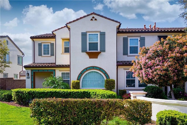 6611 Eucalyptus Ave, Chino, CA 91710 - view of front of property with a tile roof and stucco siding