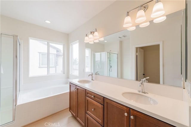 6611 Eucalyptus Ave, Chino, CA 91710 - full bathroom with a shower stall, double vanity, and a bath