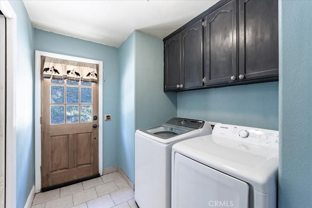 54326 Wildwood Springs Trl, North Fork, CA 93643 - laundry area with cabinet space, washing machine and clothes dryer, baseboards, and light tile patterned floors