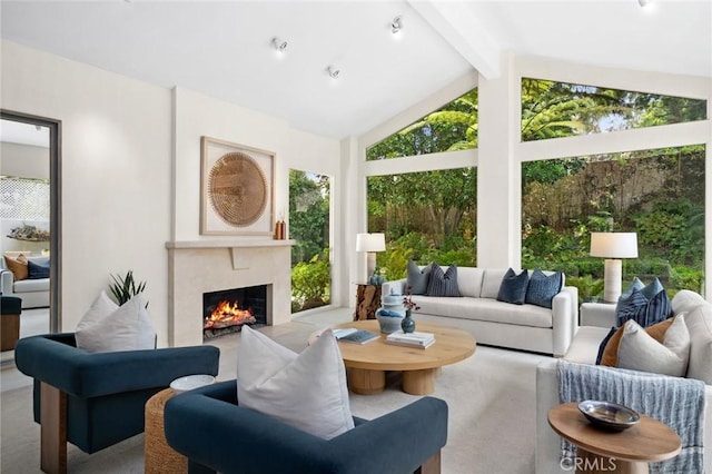 6 Rue Marseilles, Newport Beach, CA 92660 - carpeted living area with beam ceiling, a lit fireplace, and high vaulted ceiling