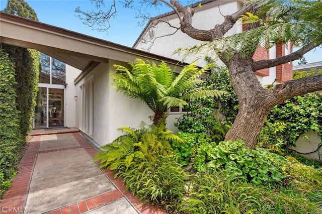 6 Rue Marseilles, Newport Beach, CA 92660 - view of exterior entry with stucco siding
