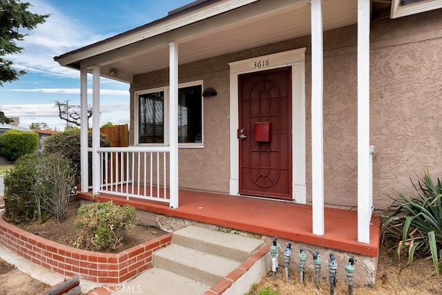 3618 Maine Ave, Long Beach, CA 90806 - entrance to property featuring a porch and stucco siding