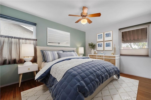 3618 Maine Ave, Long Beach, CA 90806 - bedroom with multiple windows, baseboards, and wood finished floors