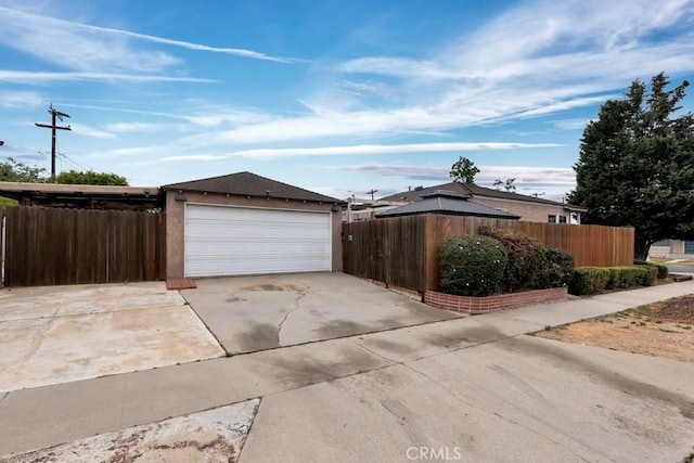 3618 Maine Ave, Long Beach, CA 90806 - garage featuring concrete driveway