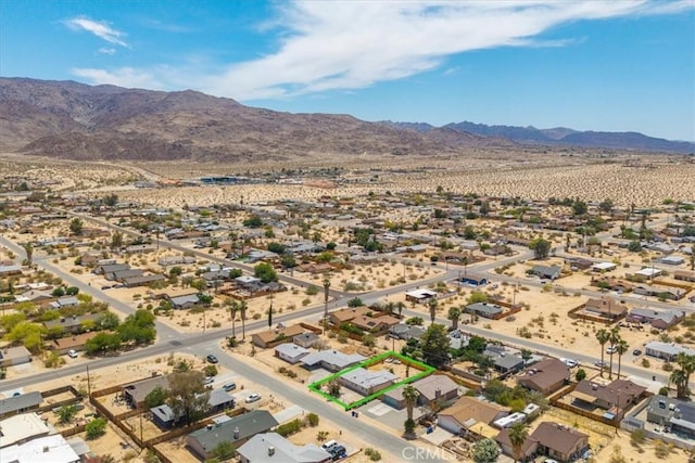 6064 Cahuilla Ave Unit 29, Palms, CA 92277 - view of property location featuring mountains, property parcel outlined, and a desert landscape