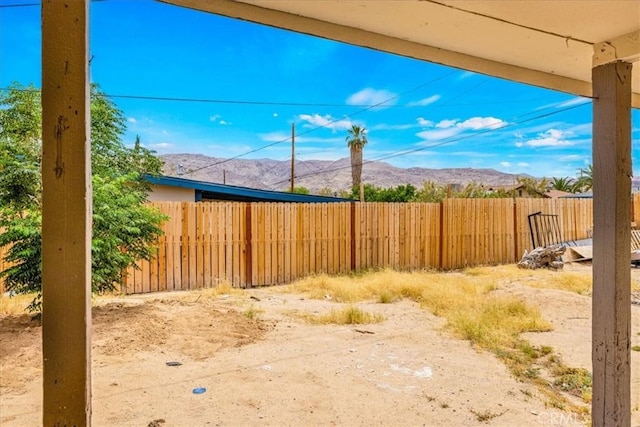 6064 Cahuilla Ave Unit 29, Palms, CA 92277 - view of yard featuring a mountain view