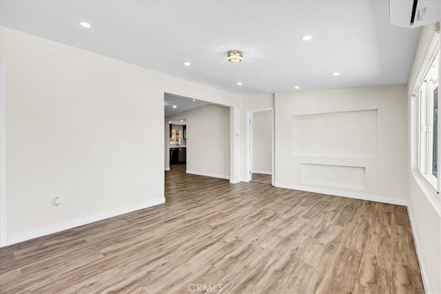 6064 Cahuilla Ave Unit 29, Palms, CA 92277 - unfurnished room featuring light wood finished floors, baseboards, and recessed lighting