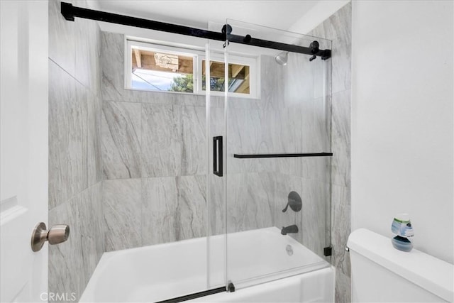 6064 Cahuilla Ave Unit 29, Palms, CA 92277 - bathroom featuring toilet and shower / bath combination with glass door