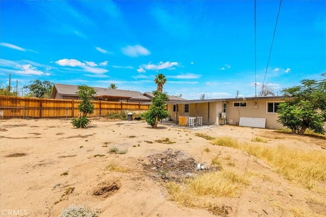 6064 Cahuilla Ave Unit 29, Palms, CA 92277 - back of property featuring stucco siding