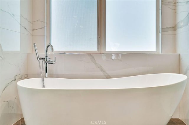 719 1st Pl, Hermosa Beach, CA 90254 - full bathroom featuring tile walls and a freestanding tub