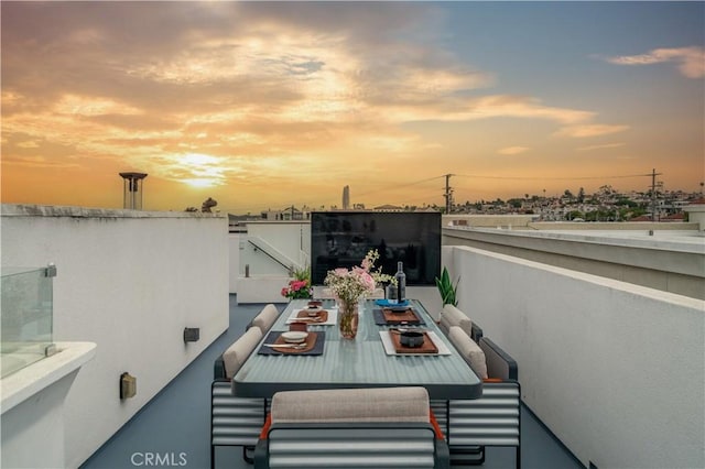 719 1st Pl, Hermosa Beach, CA 90254 - balcony at dusk featuring outdoor dining area