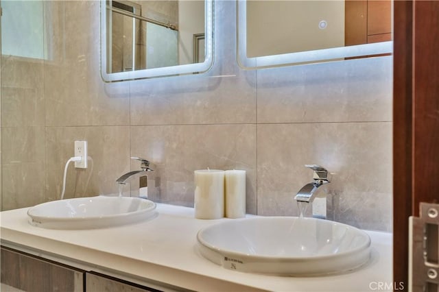 719 1st Pl, Hermosa Beach, CA 90254 - bathroom featuring tile walls and double vanity