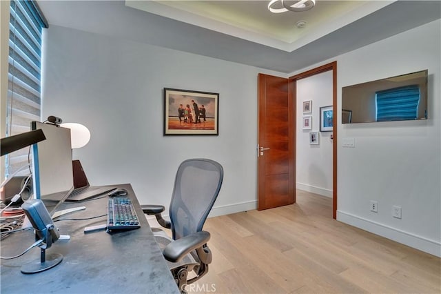 719 1st Pl, Hermosa Beach, CA 90254 - office area featuring light wood-style floors, baseboards, and a tray ceiling
