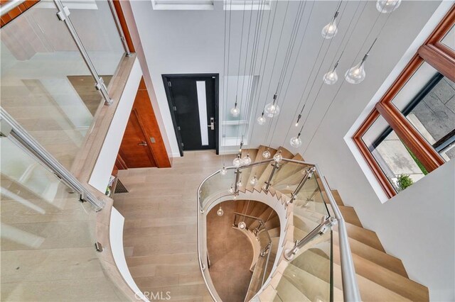 719 1st Pl, Hermosa Beach, CA 90254 - stairway featuring wood finished floors