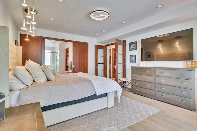 719 1st Pl, Hermosa Beach, CA 90254 - bedroom with light wood-type flooring, recessed lighting, and ensuite bathroom