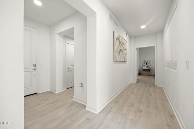 2850 Wagon Wheel Rd Unit 302, Oxnard, CA 93036 - corridor with light wood finished floors, baseboards, and recessed lighting