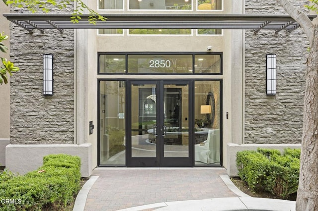 2850 Wagon Wheel Rd Unit 302, Oxnard, CA 93036 - entrance to property featuring stone siding and french doors