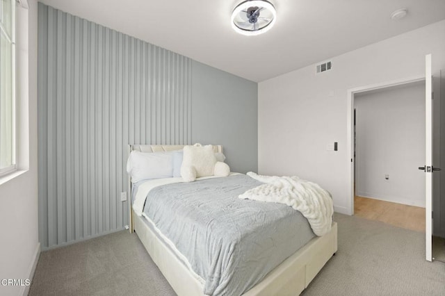 2850 Wagon Wheel Rd Unit 302, Oxnard, CA 93036 - bedroom with light carpet and baseboards