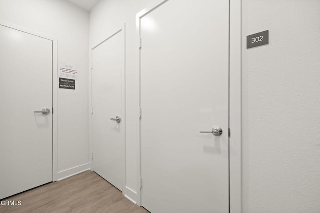 2850 Wagon Wheel Rd Unit 302, Oxnard, CA 93036 - hallway with light wood finished floors