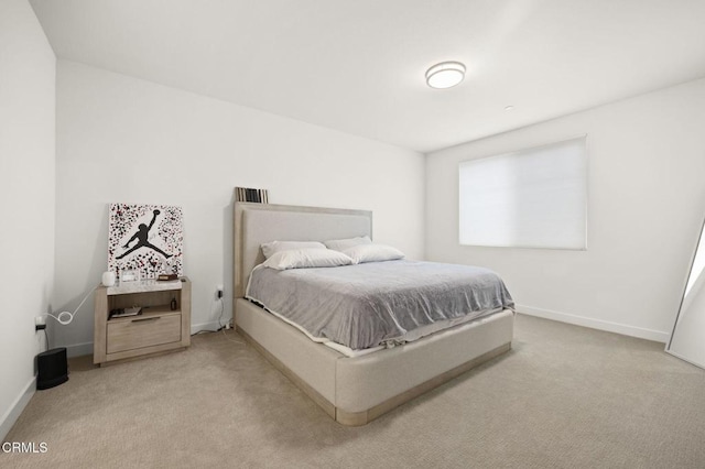2850 Wagon Wheel Rd Unit 302, Oxnard, CA 93036 - bedroom featuring light carpet and baseboards