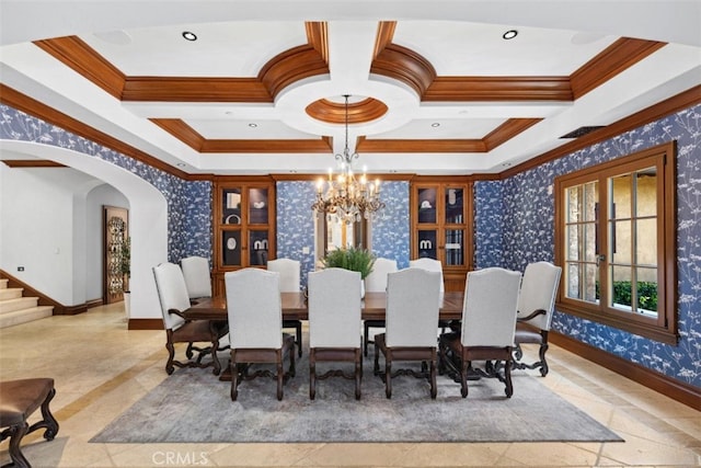 97 Canyon Crk, Irvine, CA 92603 - dining space featuring ornamental molding, wallpapered walls, a chandelier, baseboards, and arched walkways