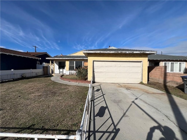 325 E 222nd St, Carson, CA 90745 - ranch-style house with driveway, an attached garage, and stucco siding
