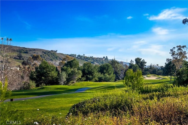 30402 Marbella, San Juan Capistrano, CA 92675 - view of property's community with view of golf course, a mountain view, and a lawn