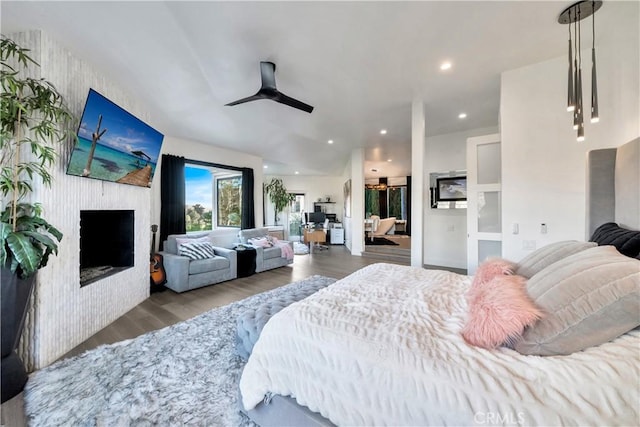 30402 Marbella, San Juan Capistrano, CA 92675 - bedroom featuring a large fireplace, wood finished floors, recessed lighting, and ceiling fan