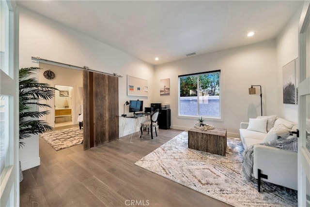 30402 Marbella, San Juan Capistrano, CA 92675 - living room featuring a desk, a barn door, wood finished floors, and recessed lighting
