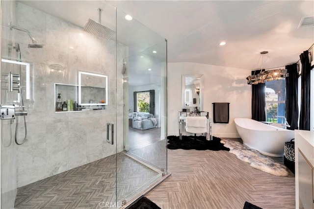 30402 Marbella, San Juan Capistrano, CA 92675 - bathroom with a shower stall, a freestanding bath, vanity, and recessed lighting