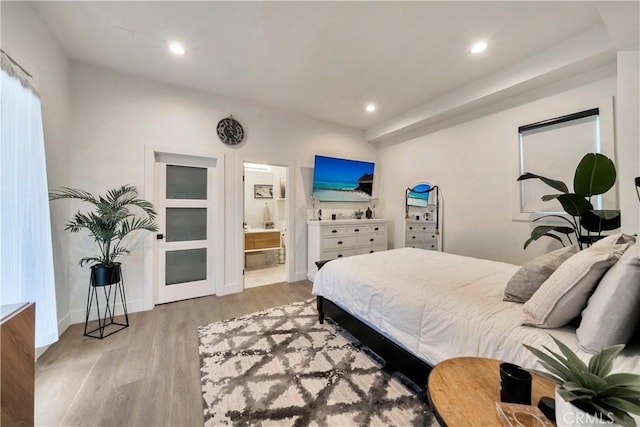 30402 Marbella, San Juan Capistrano, CA 92675 - bedroom with light wood-type flooring, recessed lighting, and connected bathroom