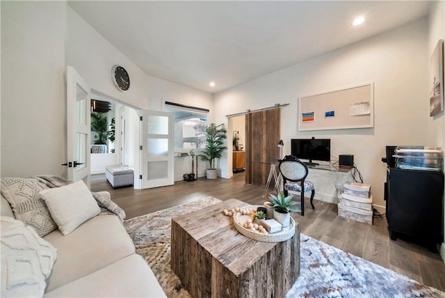 30402 Marbella, San Juan Capistrano, CA 92675 - living area featuring a barn door, wood finished floors, a desk, and recessed lighting